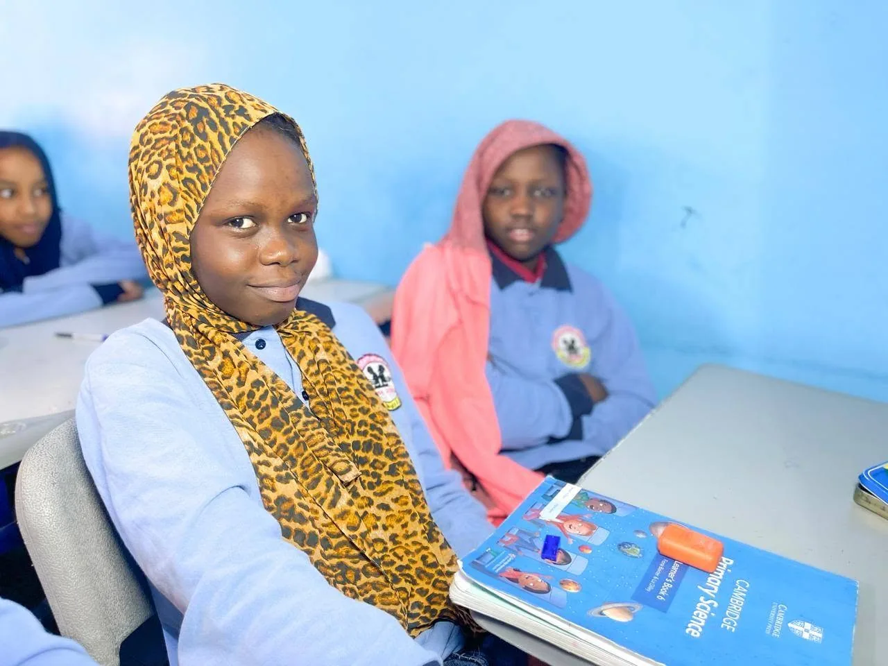 Students learning together at Readers International School